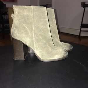 Army green Steve Madden booties.